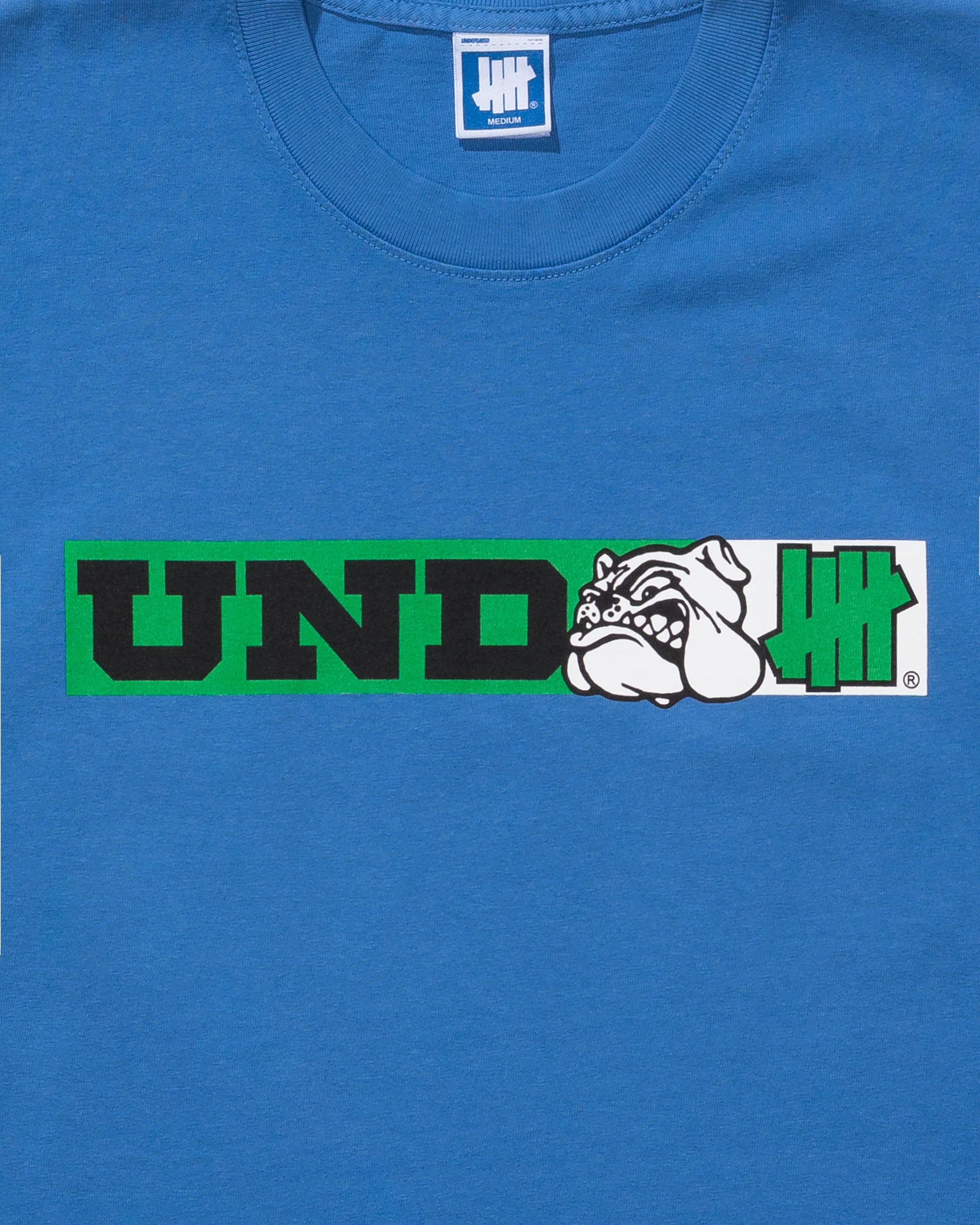 UNDEFEATED BUMPER STICKER S/S TEE - ROYAL
