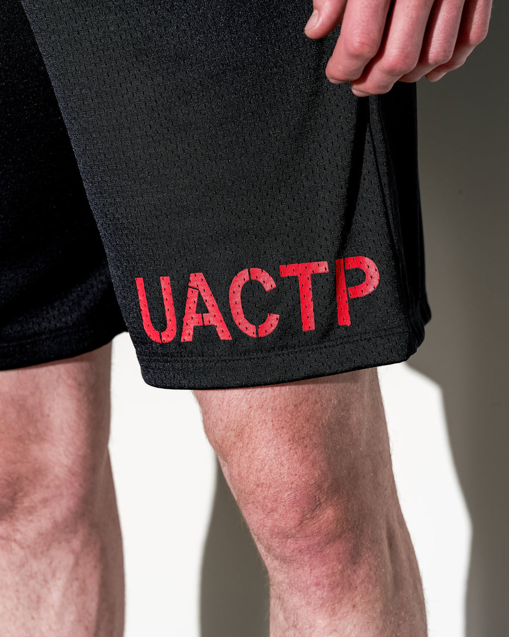 UACTP X GARDAR EIDE EINARSSON STENCIL MESH SHORT - BLACK