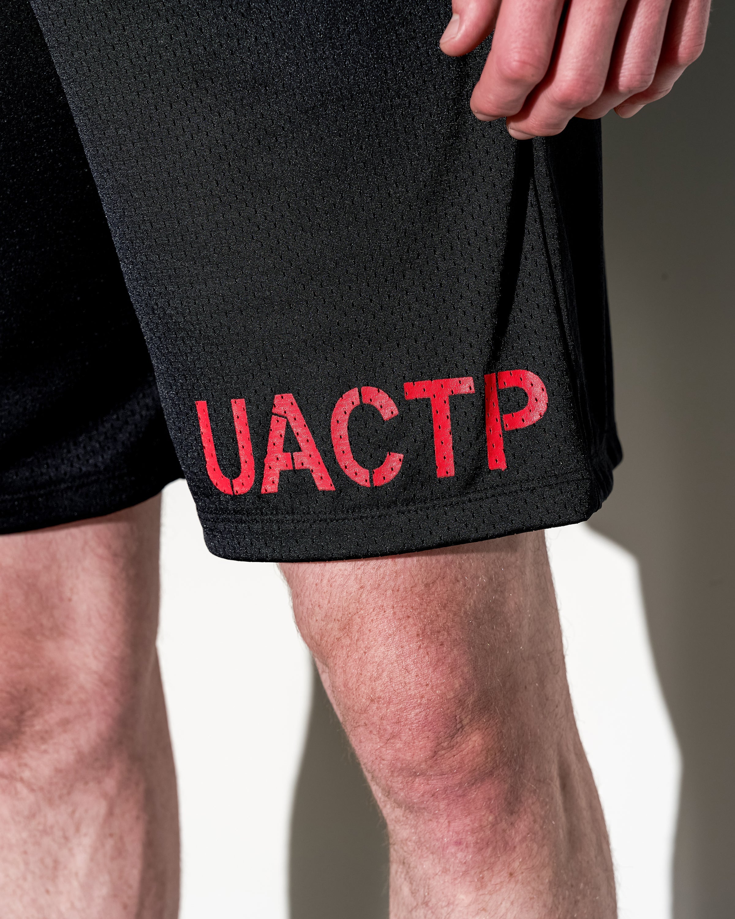UACTP X GARDAR EIDE EINARSSON STENCIL MESH SHORT - NAVY