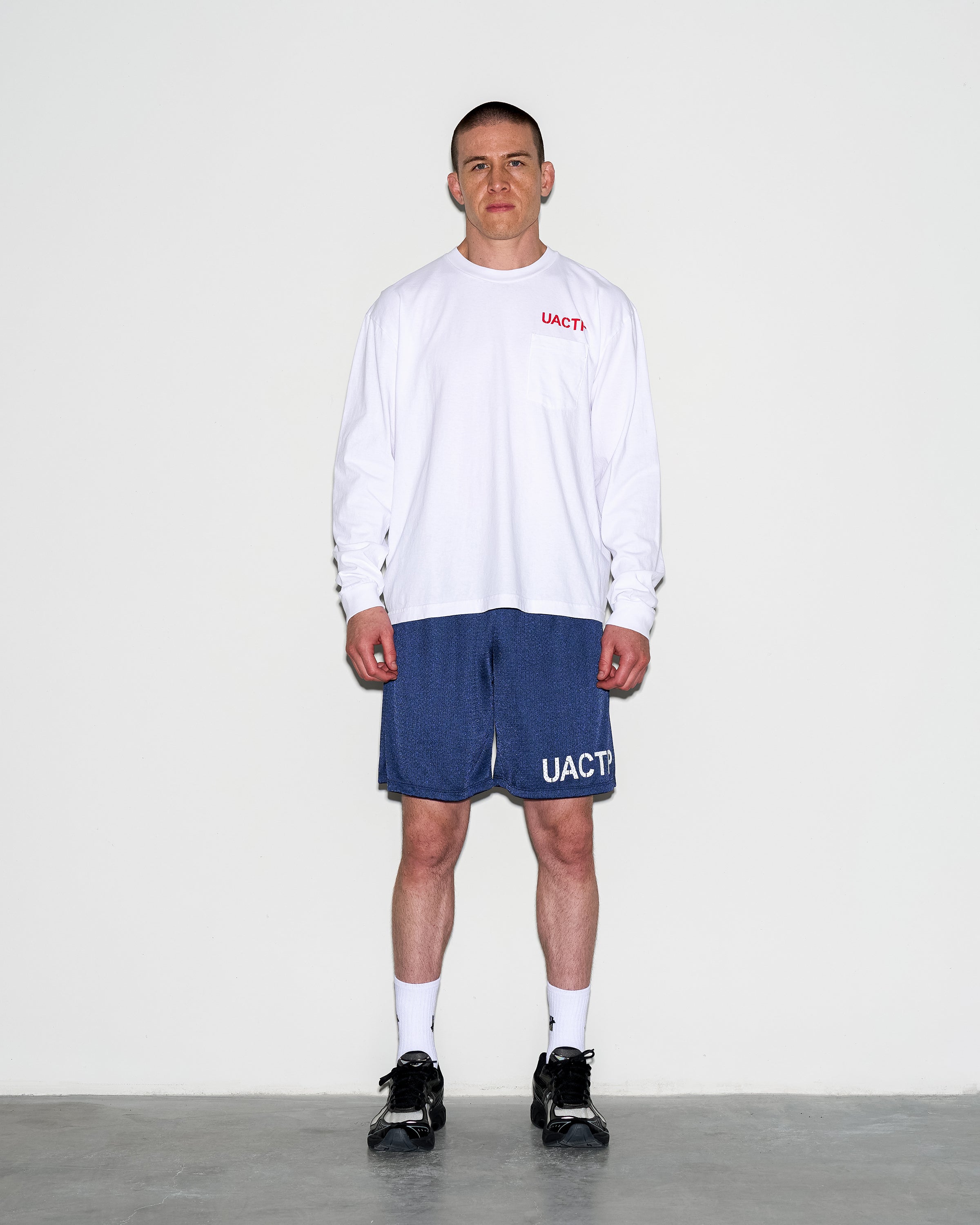 UACTP X GARDAR EIDE EINARSSON STENCIL L/S POCKET TEE - WHITE
