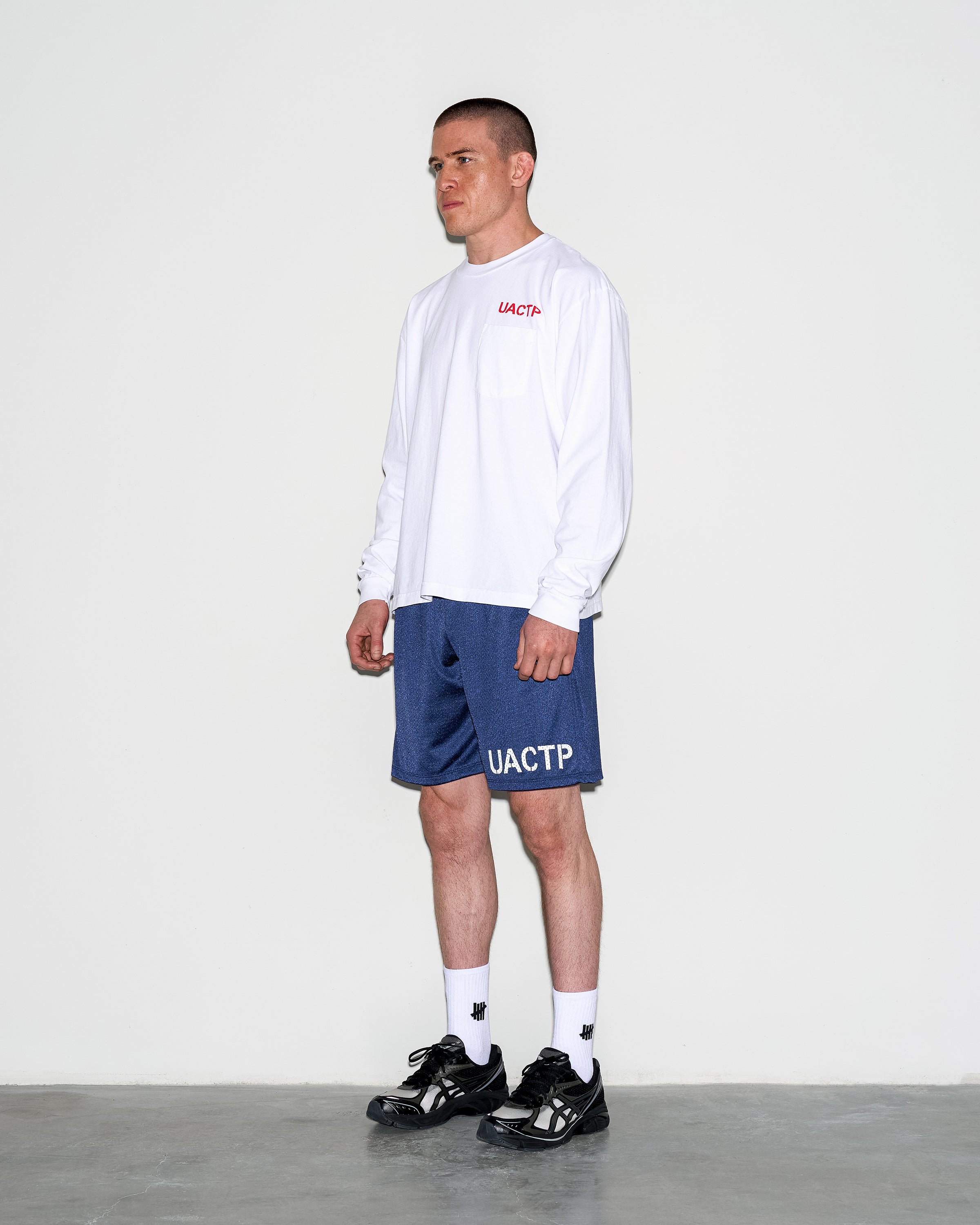 UACTP X GARDAR EIDE EINARSSON STENCIL L/S POCKET TEE - WHITE