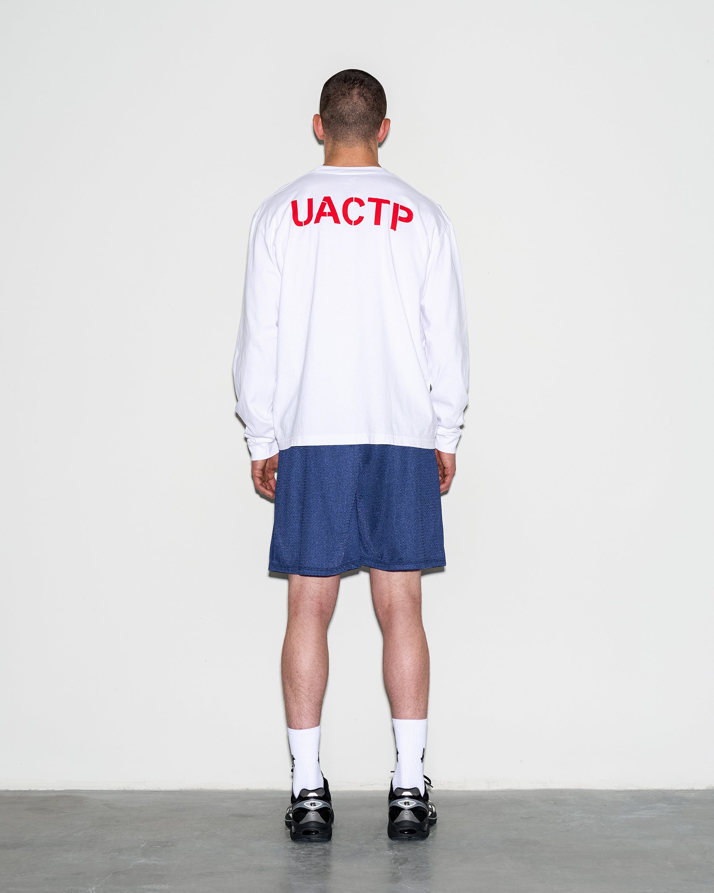 UACTP X GARDAR EIDE EINARSSON STENCIL L/S POCKET TEE - WHITE