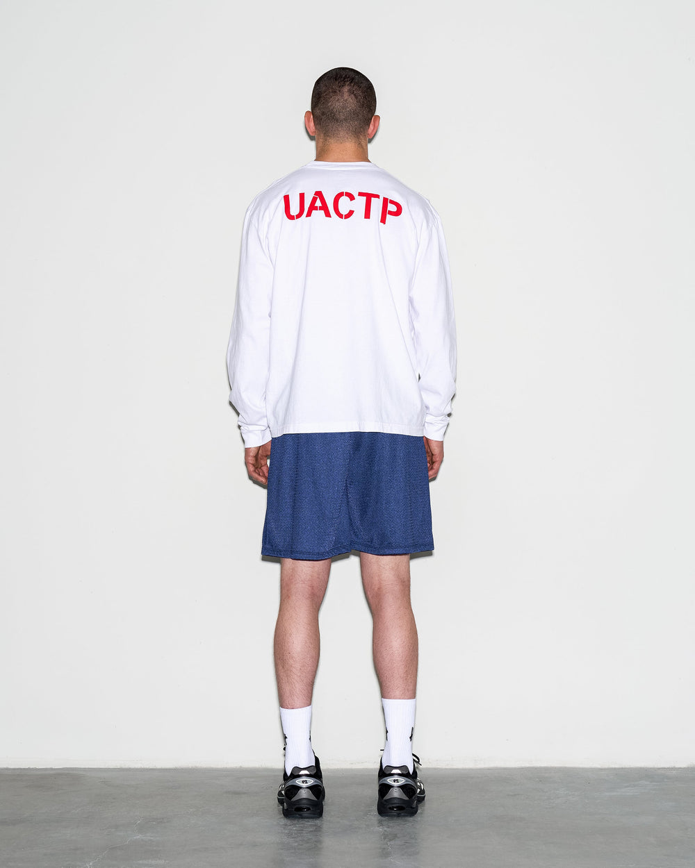 UACTP X GARDAR EIDE EINARSSON STENCIL L/S POCKET TEE - WHITE