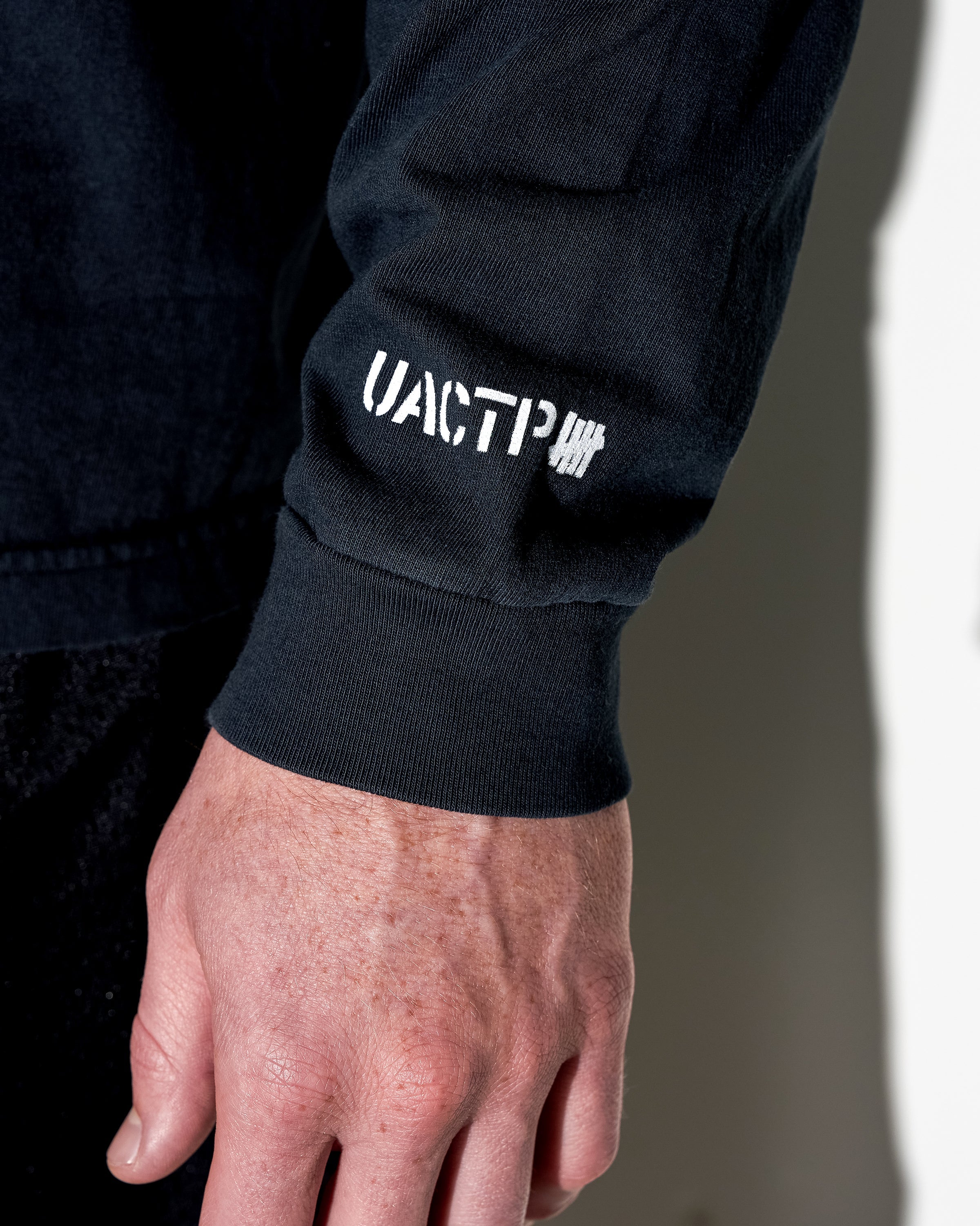 UACTP X GARDAR EIDE EINARSSON STANDARD BRIEF L/S POCKET TEE - BLACK