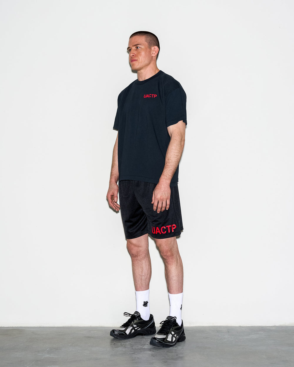 UACTP X GARDAR EIDE EINARSSON STENCIL S/S TEE - BLACK