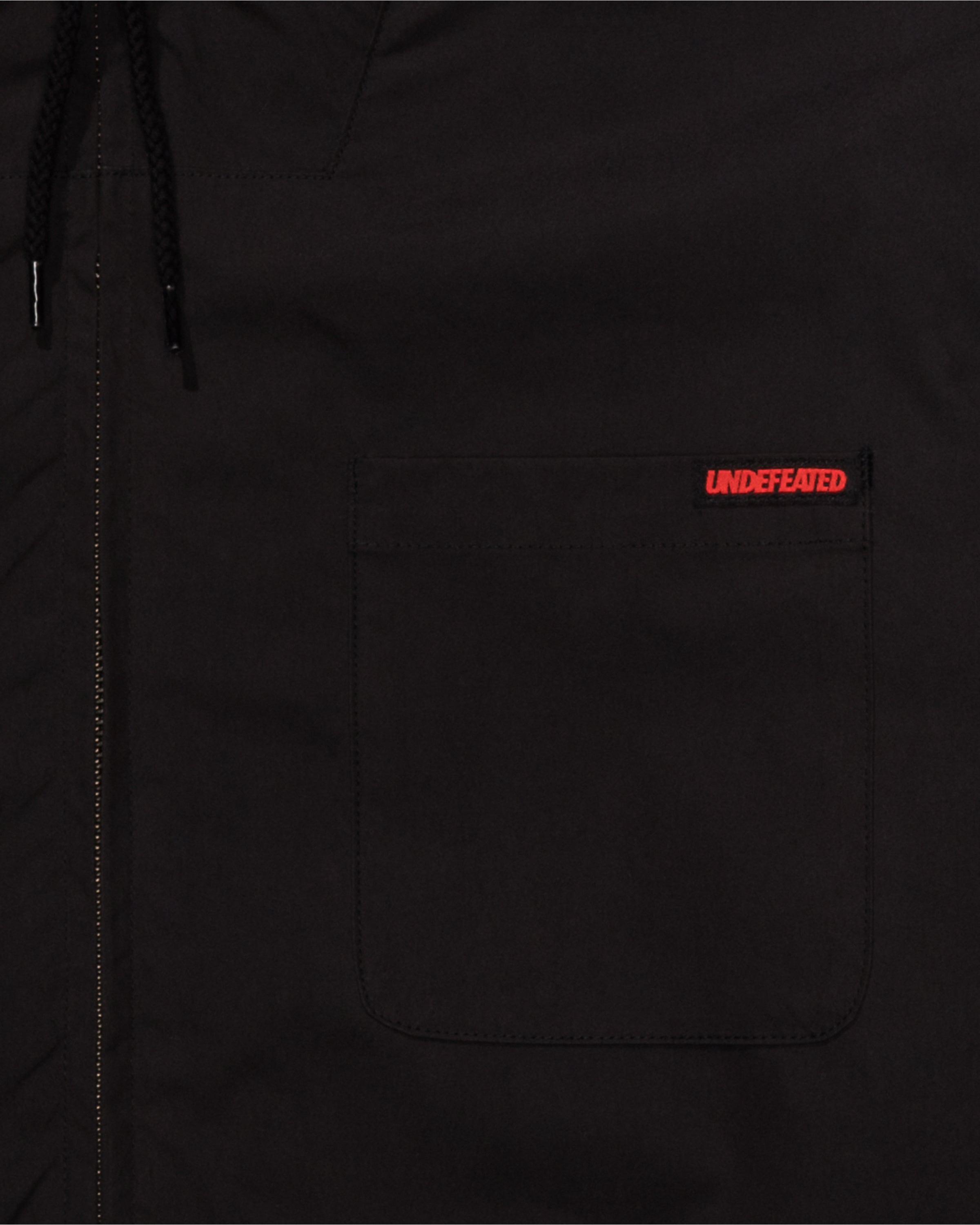 UNDEFEATED HOODED LIGHTWEIGHT WOVEN JACKET - BLACK -