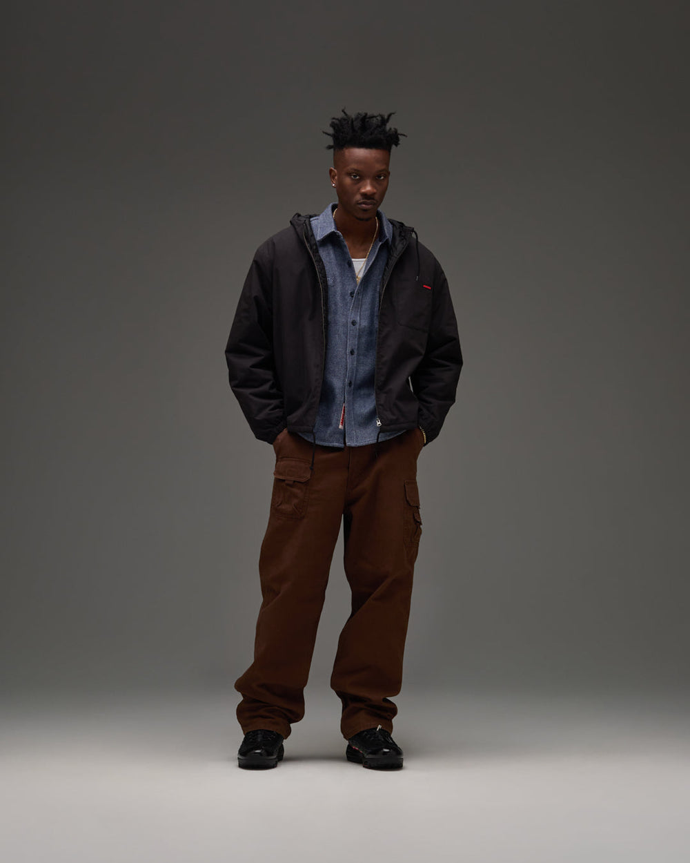 UNDEFEATED HOODED LIGHTWEIGHT WOVEN JACKET - BLACK -