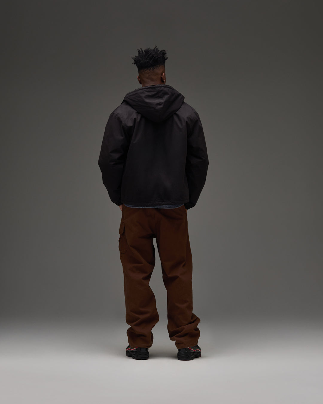 UNDEFEATED HOODED LIGHTWEIGHT WOVEN JACKET - BLACK -