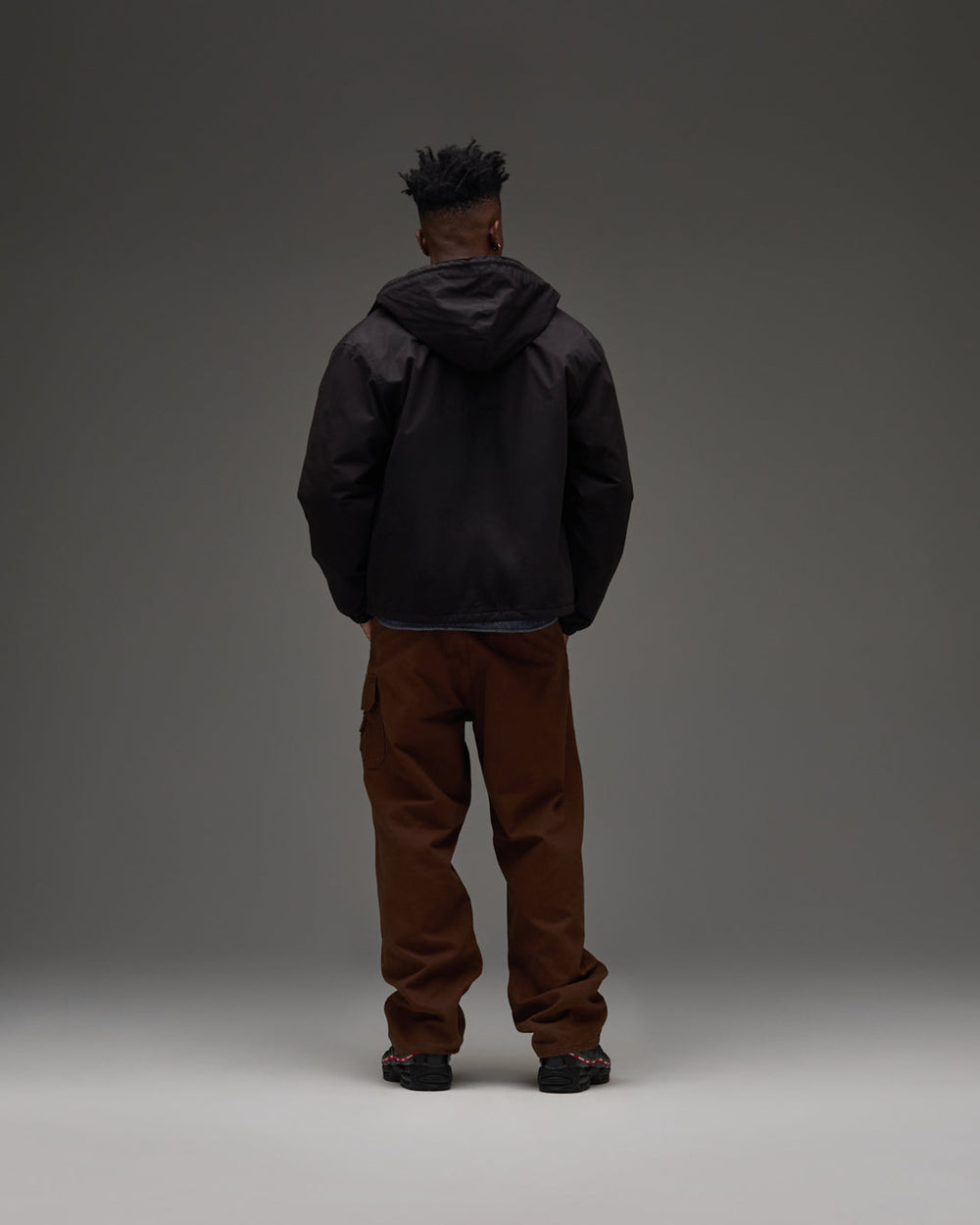 UNDEFEATED HOODED LIGHTWEIGHT WOVEN JACKET - BLACK -