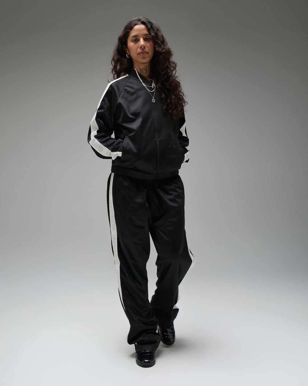 UNDEFEATED TAPED TRACK JACKET - BLACK