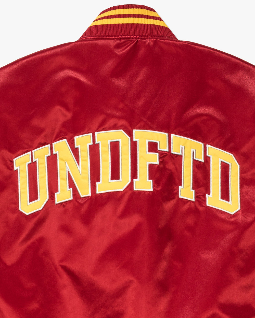 UNDEFEATED ICON SATIN VARSITY JACKET - SCARLET -