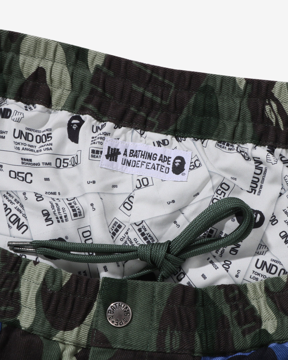 BAPE X UNDEFEATED COLOR CAMO FLANNEL PANTS - GREEN