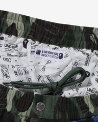 BAPE X UNDEFEATED COLOR CAMO FLANNEL PANTS - GREEN