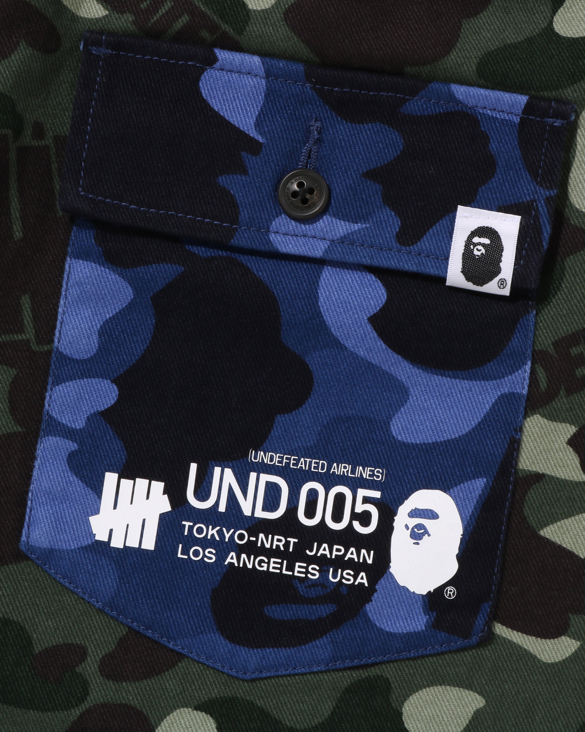 BAPE X UNDEFEATED COLOR CAMO FLANNEL PANTS - GREEN