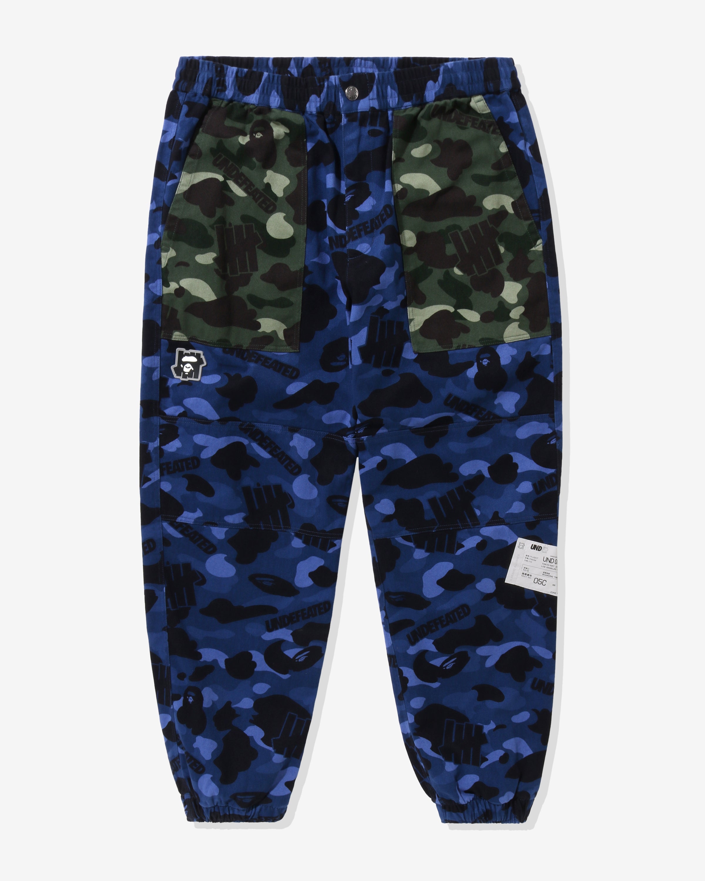 BAPE X UNDEFEATED COLOR CAMO FLANNEL PANTS - NAVY