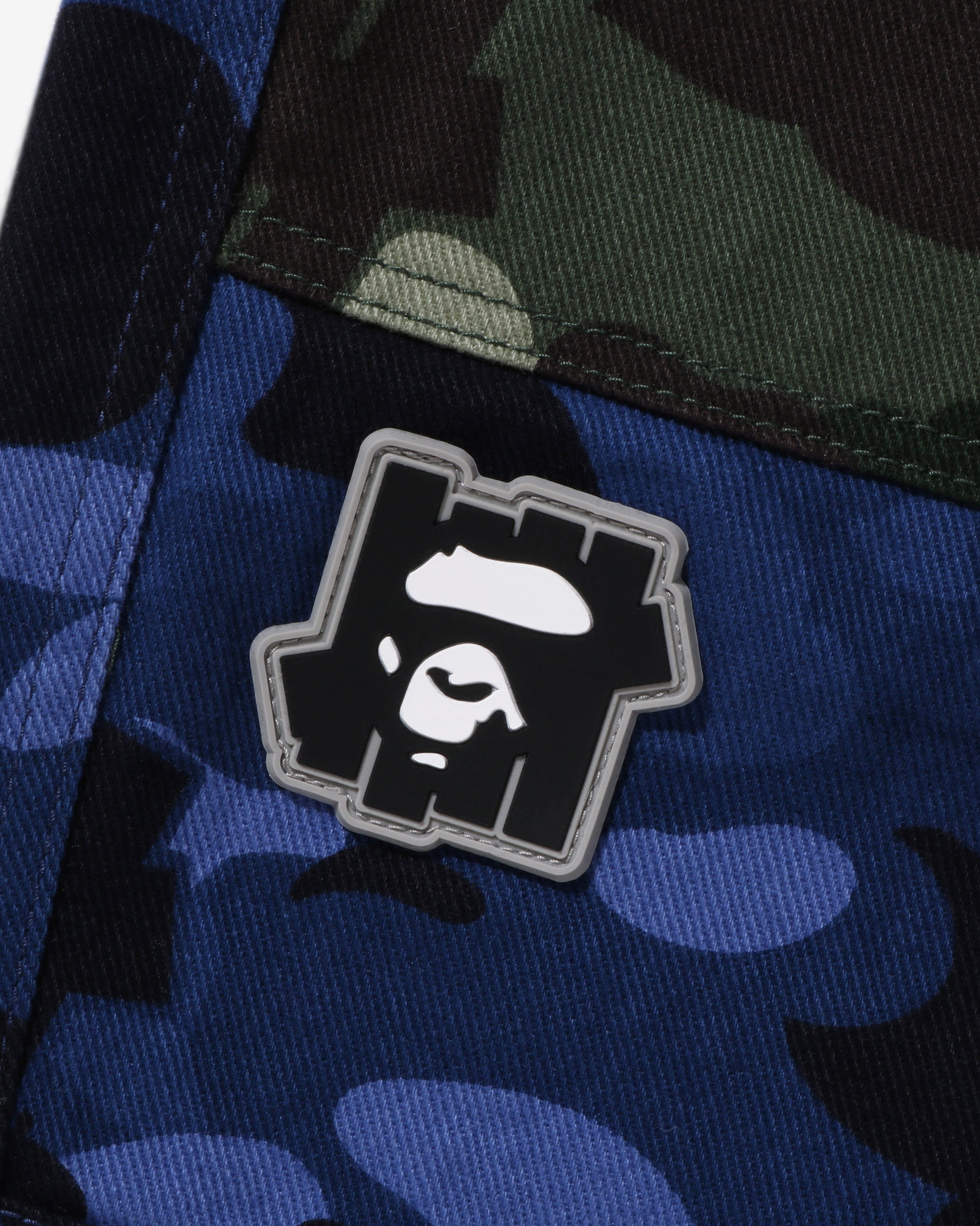 BAPE X UNDEFEATED COLOR CAMO FLANNEL PANTS - NAVY