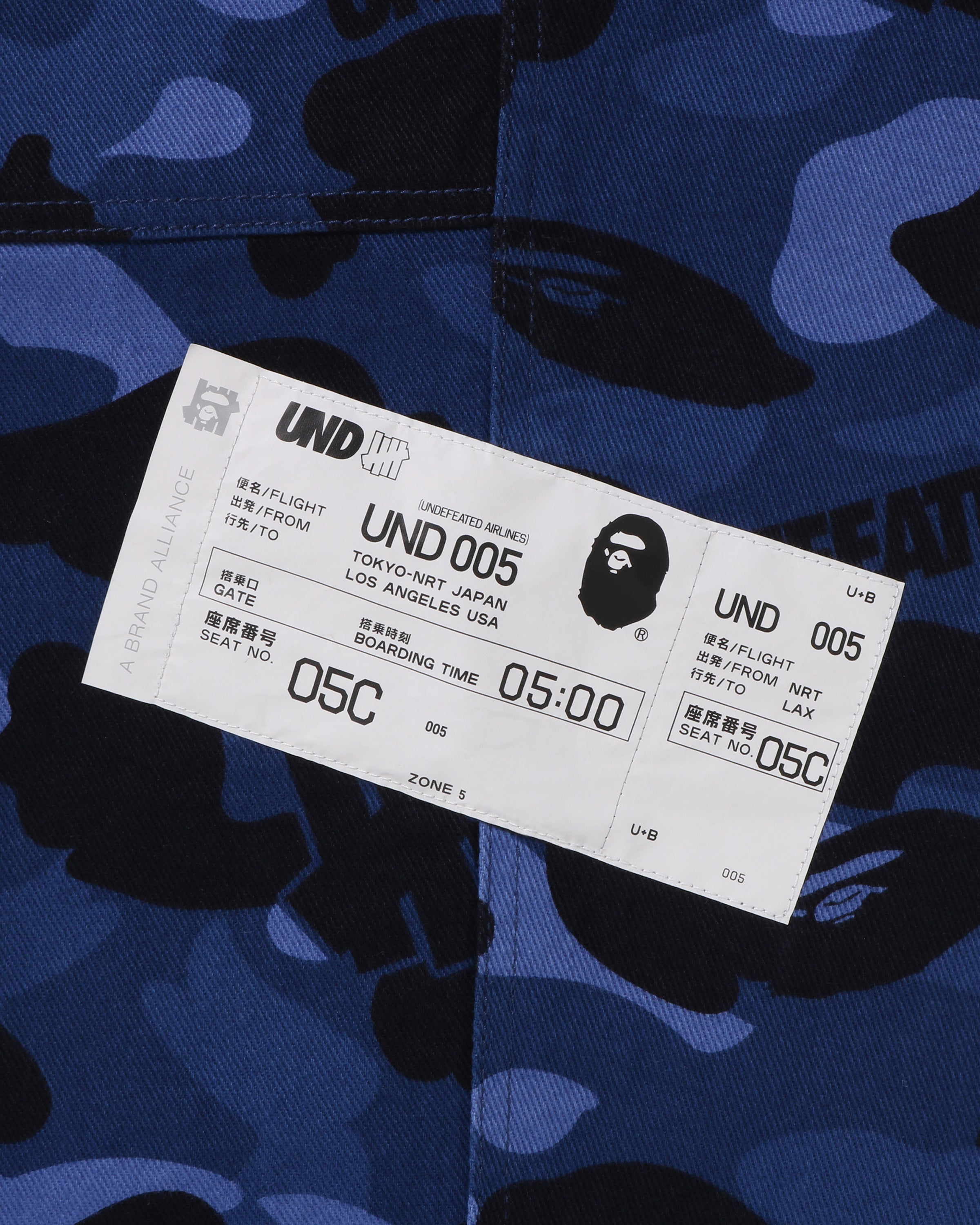 BAPE X UNDEFEATED COLOR CAMO FLANNEL PANTS - NAVY