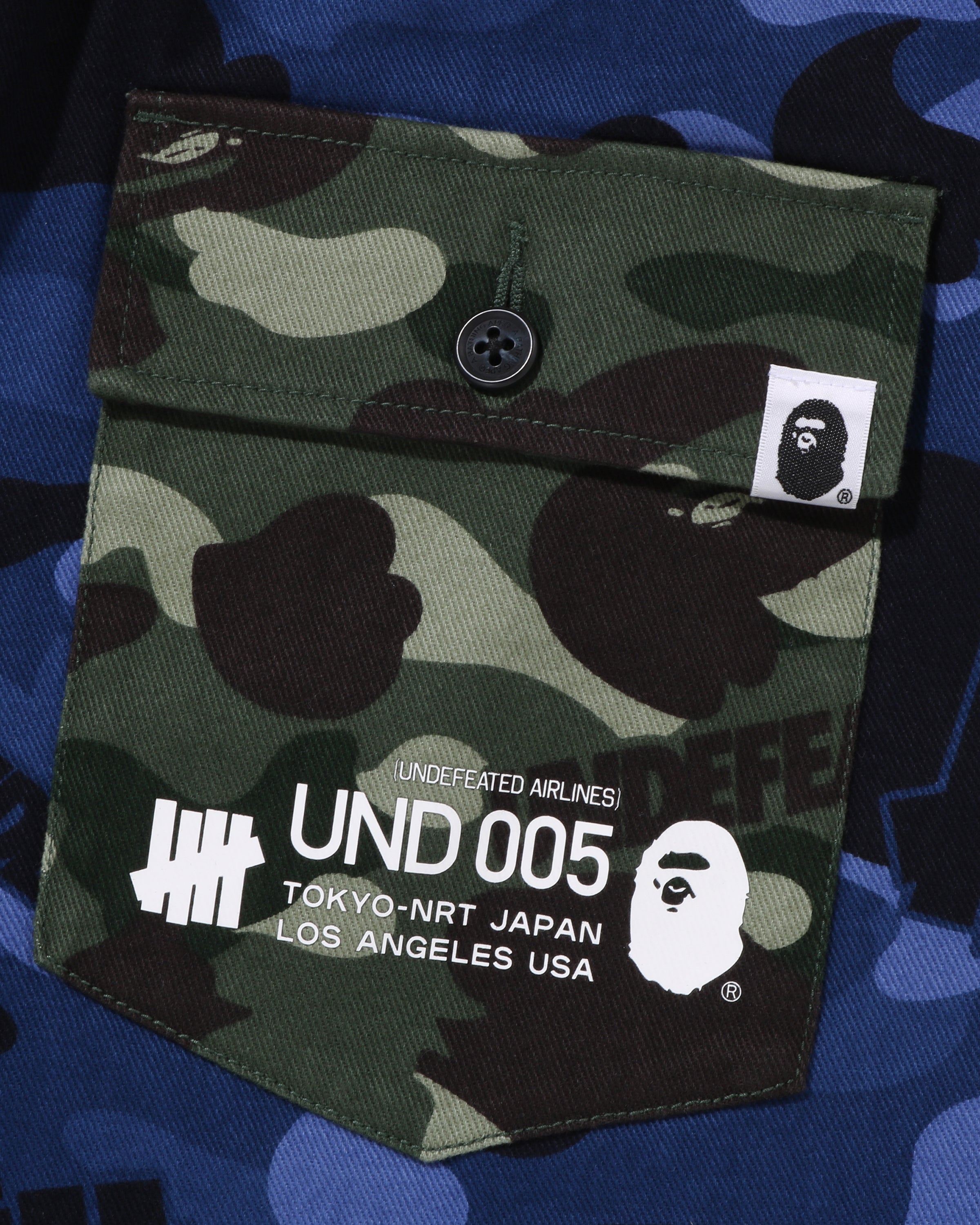 BAPE X UNDEFEATED COLOR CAMO FLANNEL PANTS - NAVY