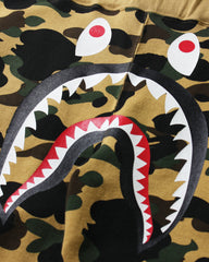 BAPE 1ST CAMO SHARK SLIM FIT SWEAT PANTS - YELLOW