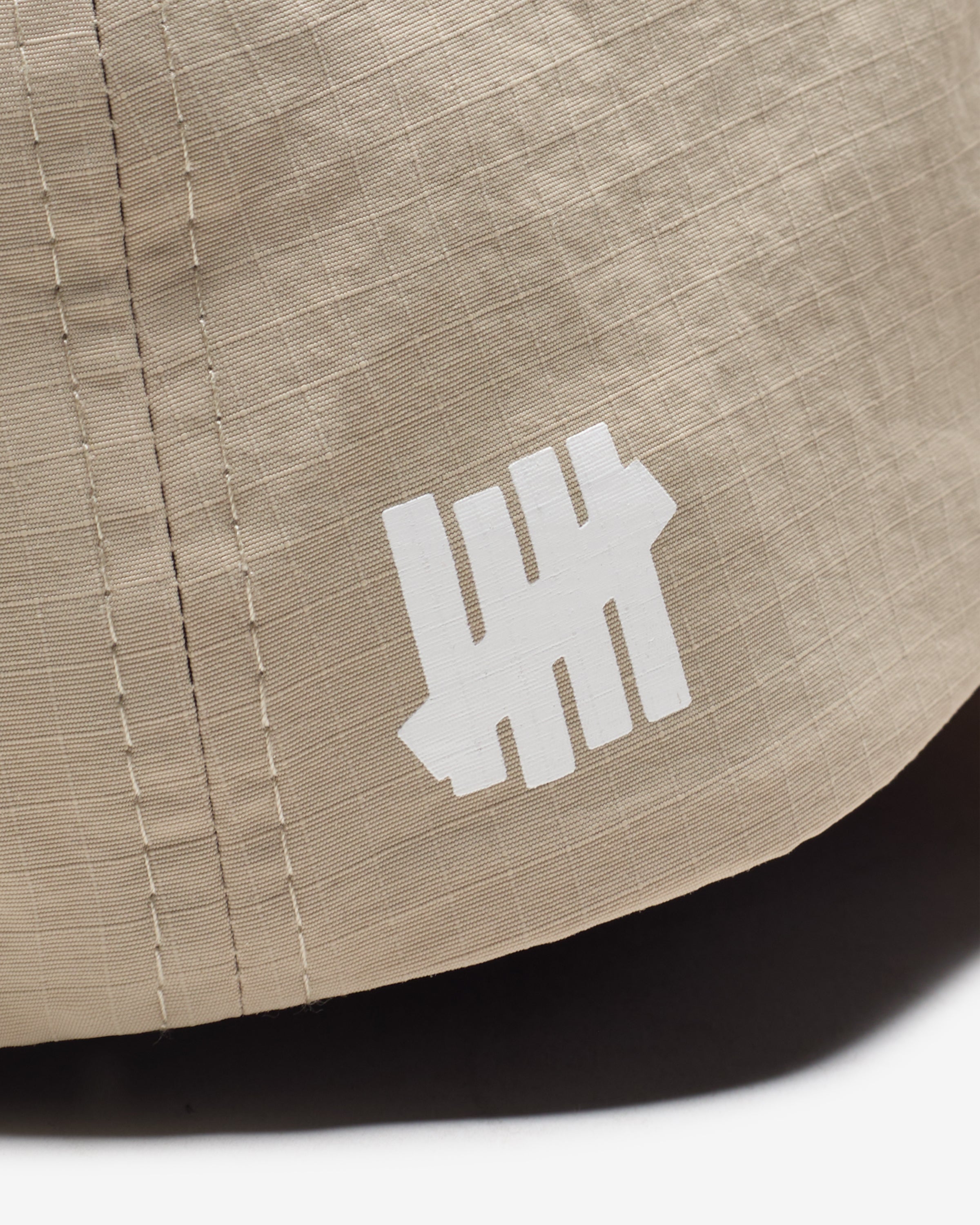 UNDEFEATED STENCIL STRAPBACK - LIGHT KHAKI