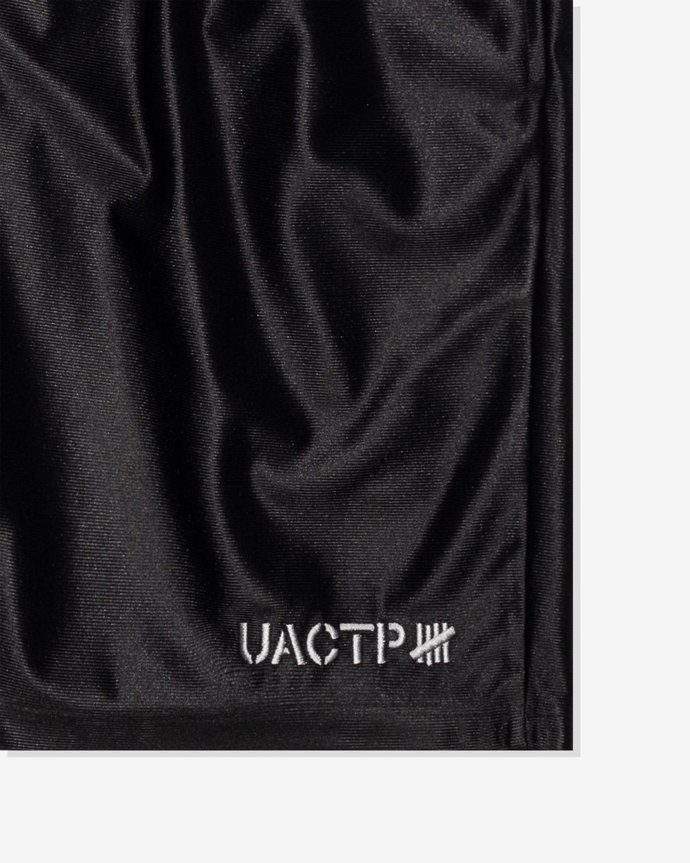 UACTP DAZZLE SHORTS - BLACK